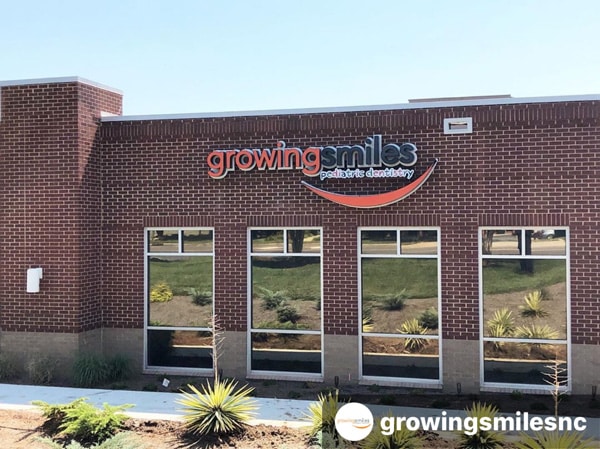 Growing Smiles Sign