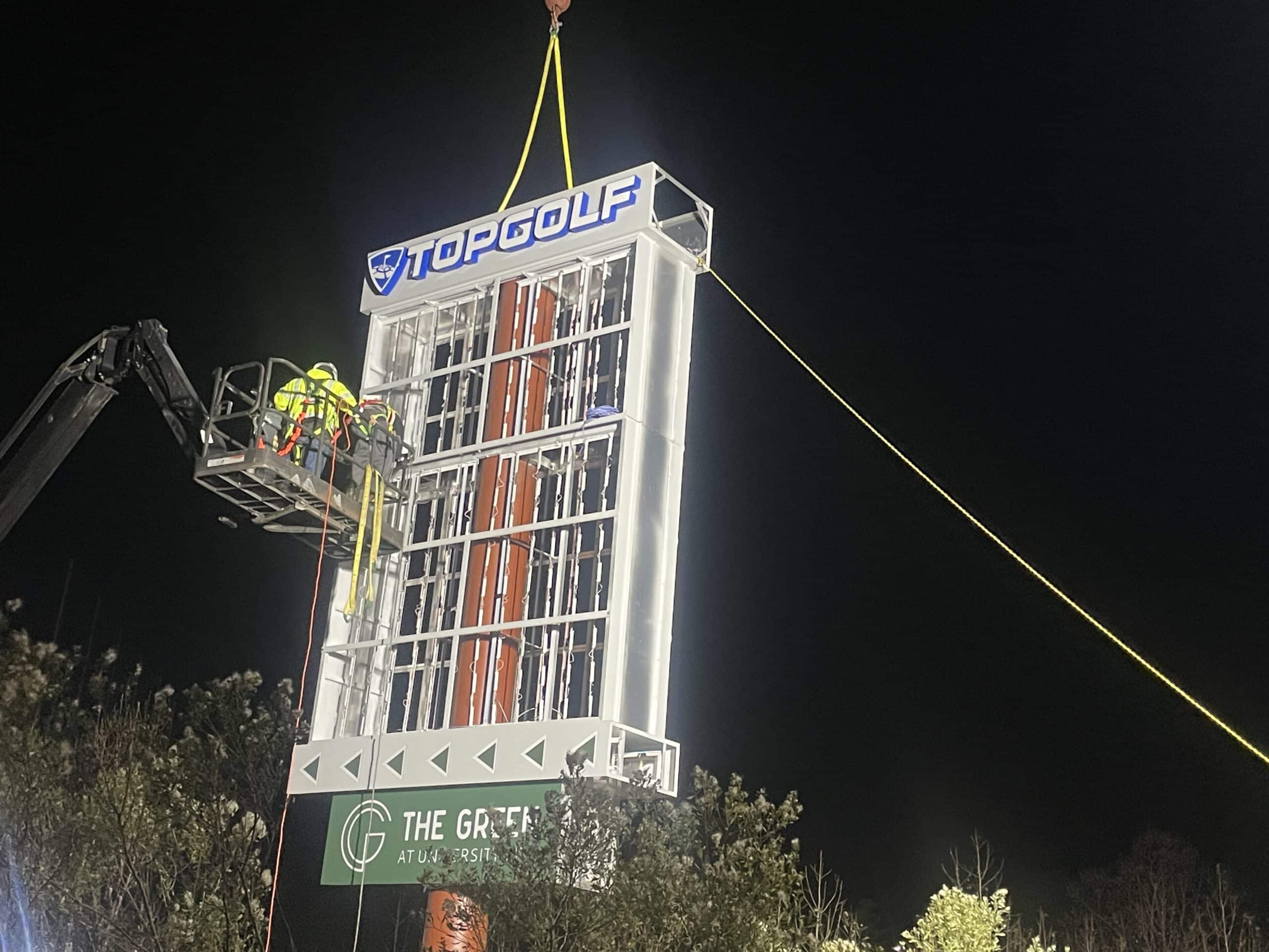 Sign Install at night